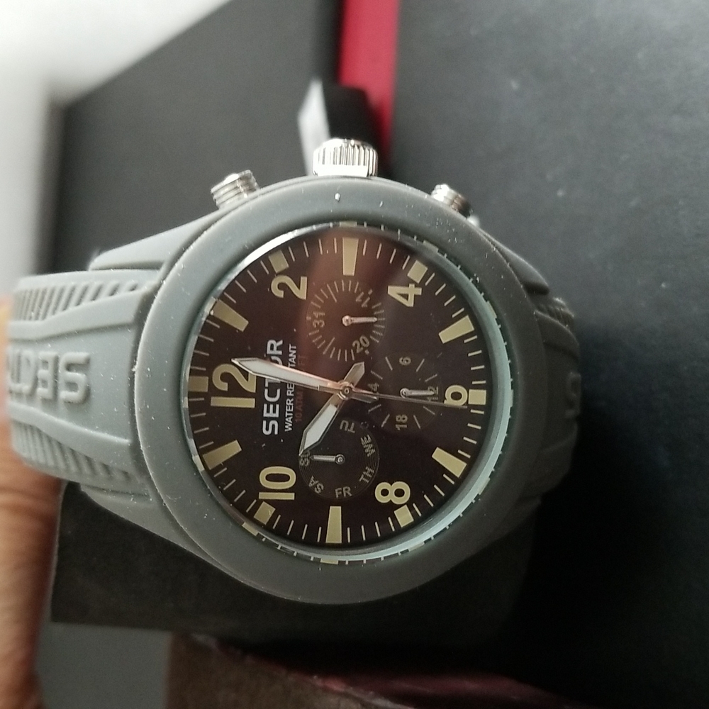 Sector men watch.  In grey rubber band New with tag and original box.